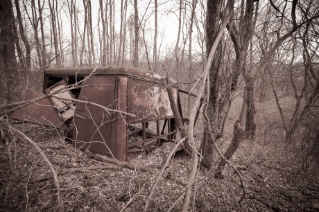Based on the size of the trees that have grown around this abandoned delivery truck...